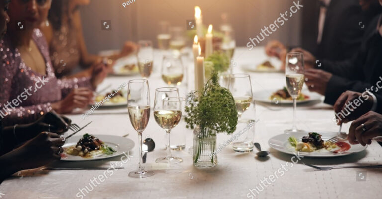 stock-photo-hands-dinner-and-business-people-at-party-with-food-drinks-or-plate-for-charity-drive-at-night-2525980297